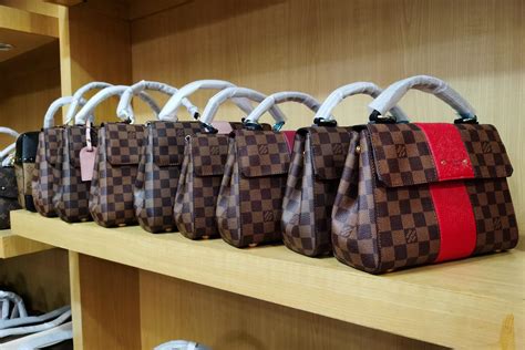 louis vuitton dfatte ib cina|louis vuitton counterfeit id.